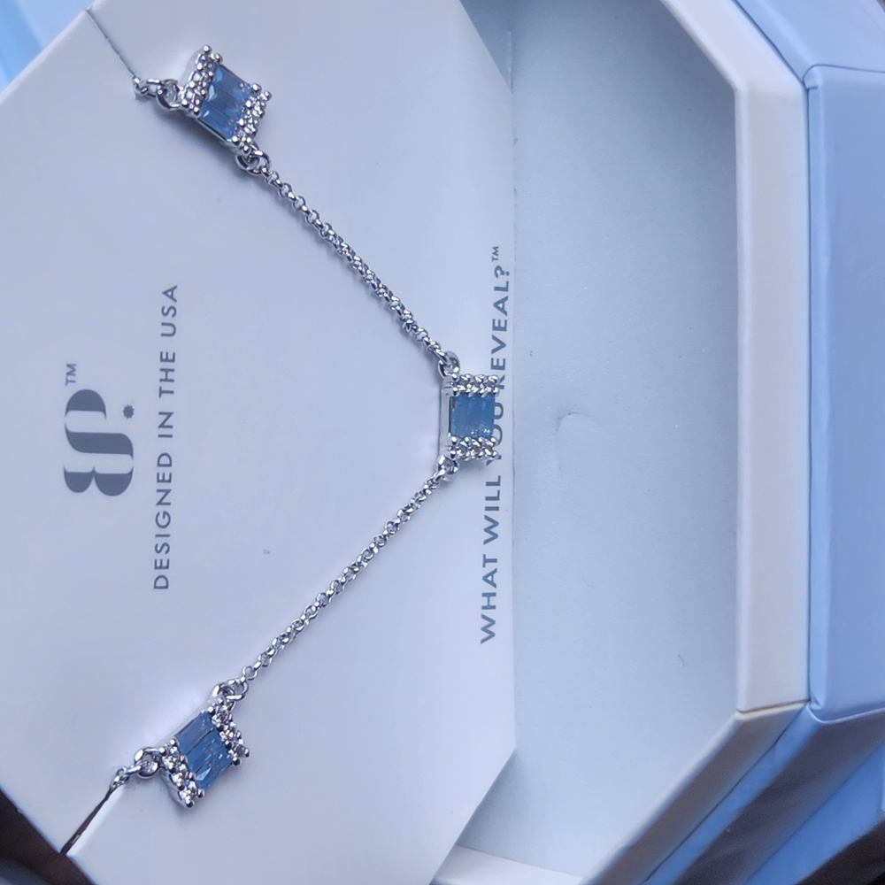 Elegant Silver Bracelet with Blue Accents